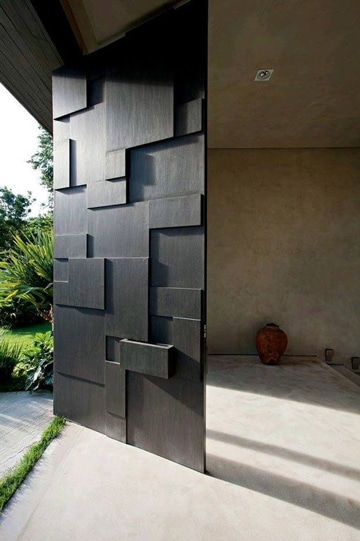 diseños de puertas de metal para casas doble altura