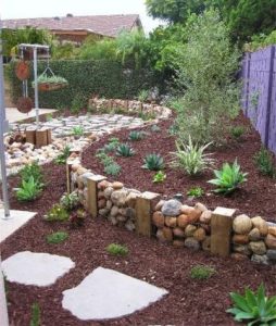 decoracion de jardines con piedras y plantas caminos