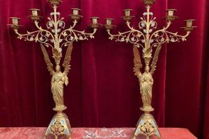 tipos de candelabros antiguos con figuras