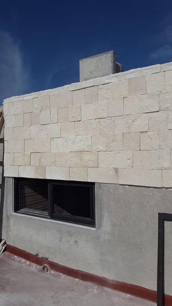 fachadas con cantera blanca piedra grande